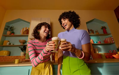 Two girls cheers  900 x 570 px
